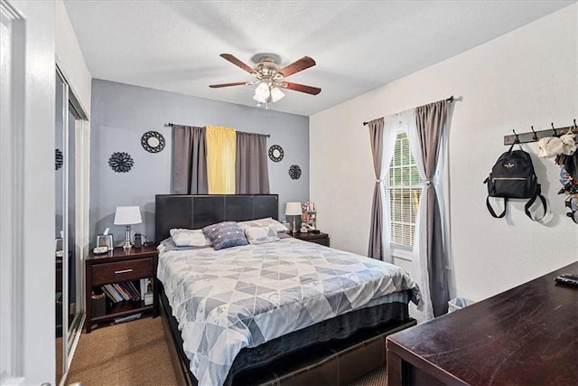 3021 Topping Ave, Kansas City, MO 64129 - bedroom with carpet floors and a ceiling fan