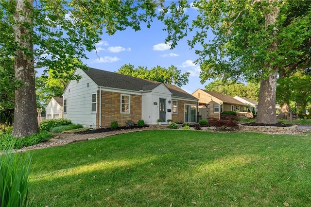 3600 NE 52nd Ter, Kansas City, MO 64119 - ranch-style house featuring a front lawn and stone siding