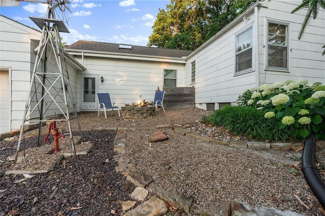 3600 NE 52nd Ter, Kansas City, MO 64119 - back of property with a fire pit
