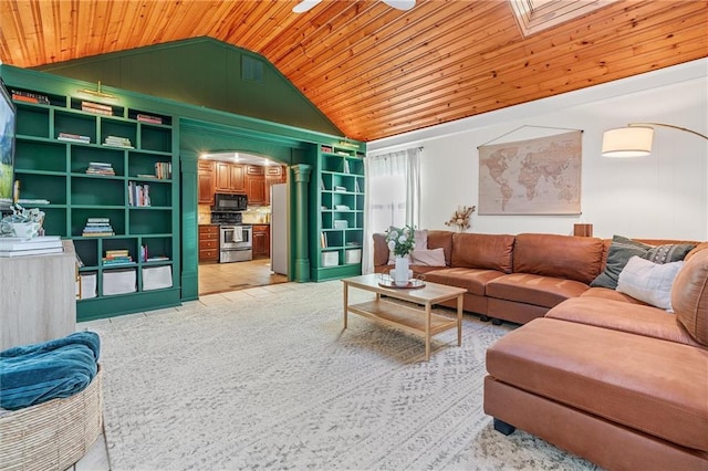 3600 NE 52nd Ter, Kansas City, MO 64119 - living room with lofted ceiling, wooden ceiling, a skylight, and light tile patterned floors