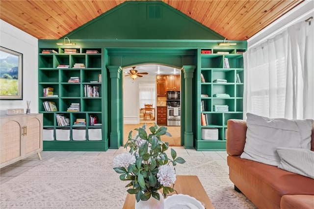 3600 NE 52nd Ter, Kansas City, MO 64119 - tiled living room with wood ceiling, vaulted ceiling, decorative columns, and arched walkways