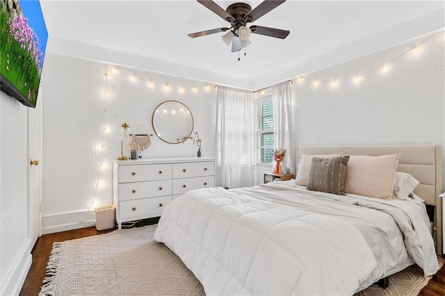 3600 NE 52nd Ter, Kansas City, MO 64119 - bedroom with wood finished floors and a ceiling fan