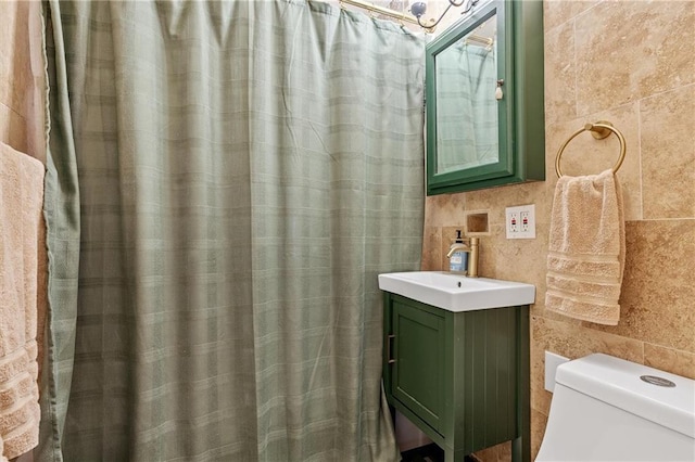 3600 NE 52nd Ter, Kansas City, MO 64119 - full bathroom with tile walls, vanity, and a shower with shower curtain