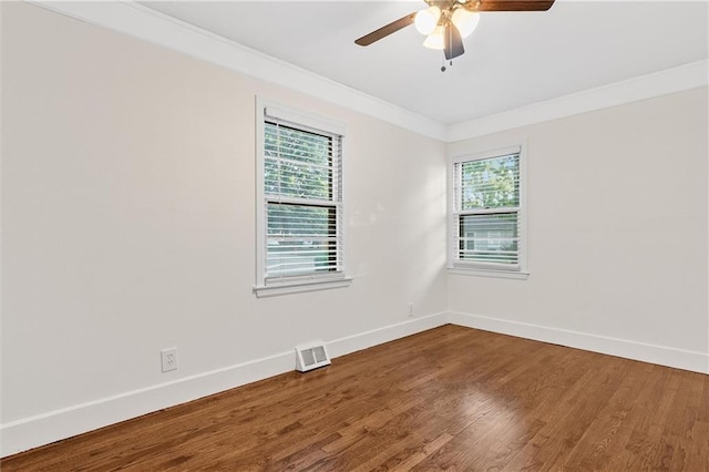 3600 NE 52nd Ter, Kansas City, MO 64119 - unfurnished room featuring ornamental molding, a ceiling fan, and wood finished floors