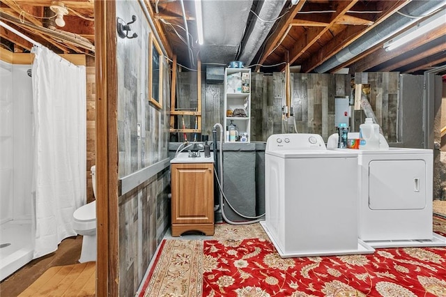 3600 NE 52nd Ter, Kansas City, MO 64119 - laundry room featuring independent washer and dryer and light wood-style flooring