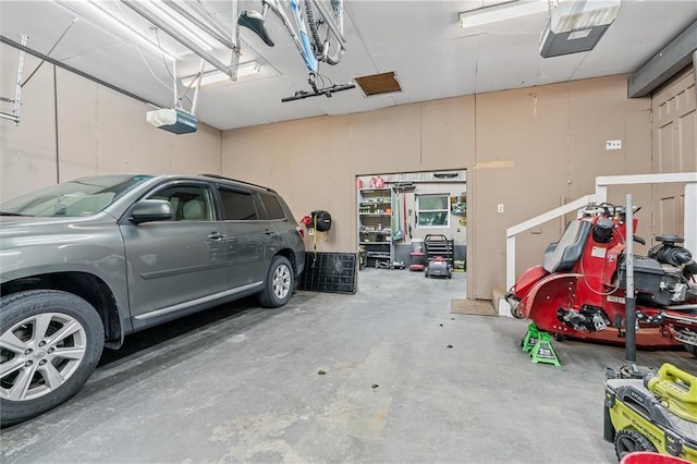 3600 NE 52nd Ter, Kansas City, MO 64119 - garage with a garage door opener