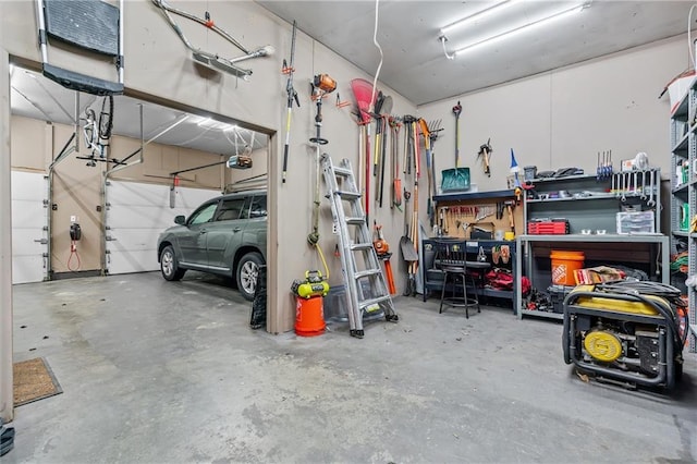 3600 NE 52nd Ter, Kansas City, MO 64119 - garage featuring a garage door opener