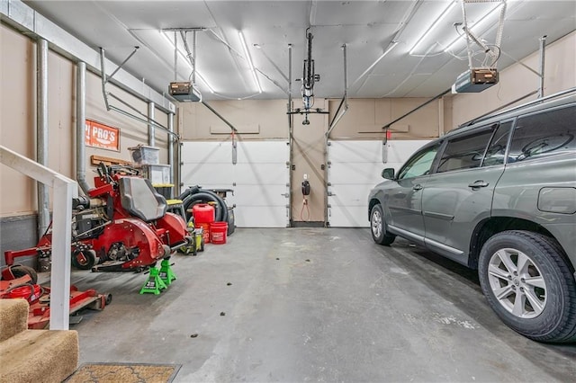 3600 NE 52nd Ter, Kansas City, MO 64119 - garage featuring a garage door opener