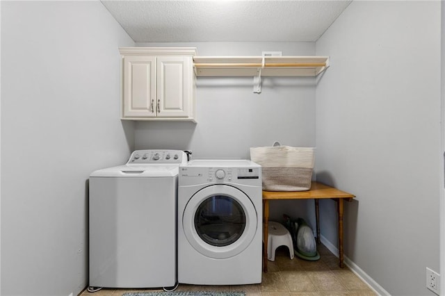 14920 S Roxburghe St, Olathe, KS 66061 - washroom featuring cabinet space, washing machine and clothes dryer, and a textured ceiling