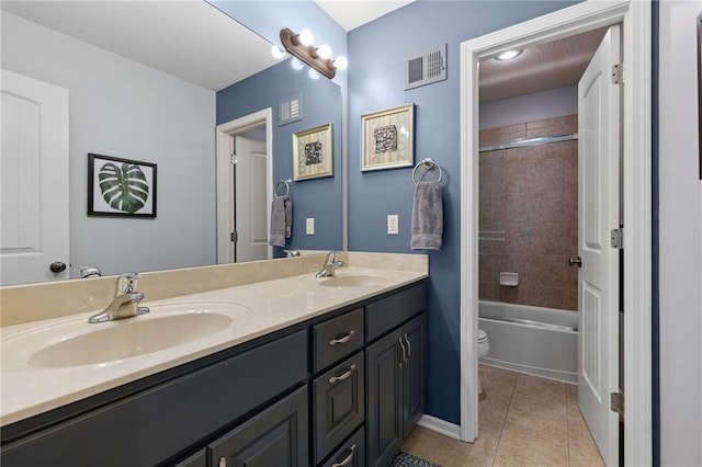 14920 S Roxburghe St, Olathe, KS 66061 - full bathroom featuring double vanity, tile patterned flooring, and shower / bathtub combination
