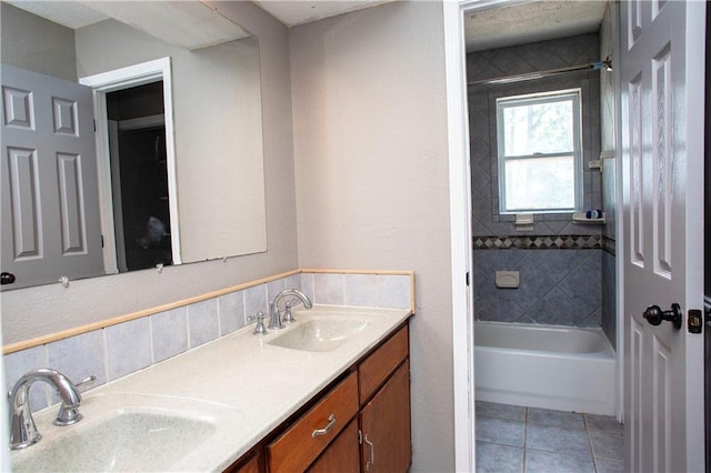 19707 E 14th St, Independence, MO 64056 - full bathroom with double vanity, tile patterned flooring, and shower / tub combination