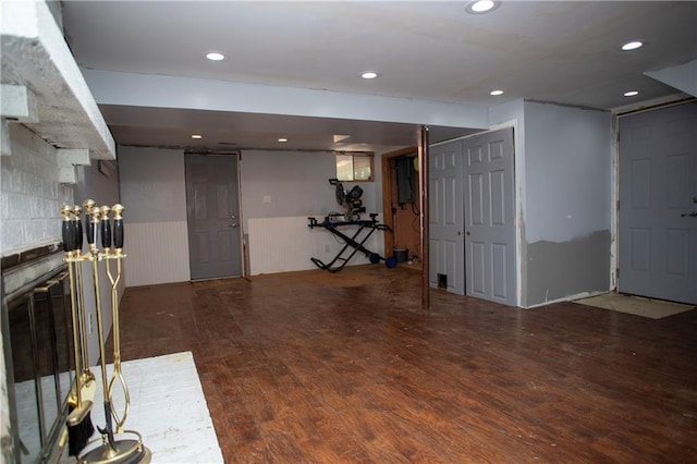 19707 E 14th St, Independence, MO 64056 - unfurnished living room featuring wood finished floors, wainscoting, and recessed lighting