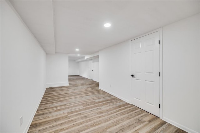 7909 Arnote Rd, Pleasant Valley, MO 64068 - finished below grade area with light wood-style floors and recessed lighting