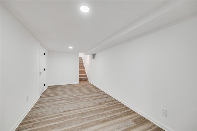 7909 Arnote Rd, Pleasant Valley, MO 64068 - finished basement with stairway, recessed lighting, and light wood finished floors