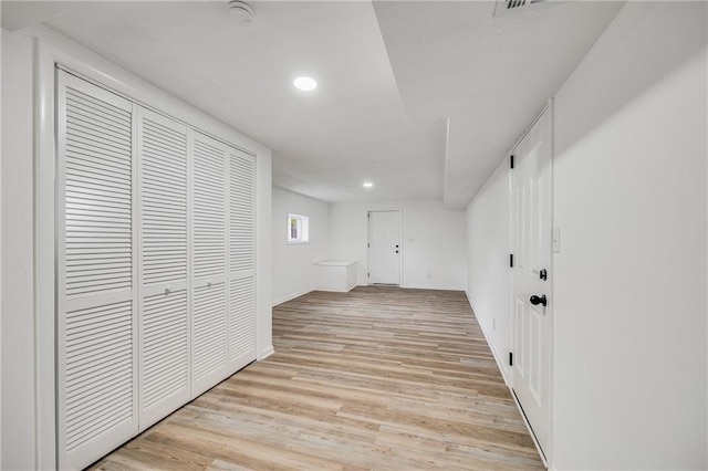 7909 Arnote Rd, Pleasant Valley, MO 64068 - corridor with light wood-style floors and recessed lighting