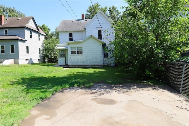 2603 Patee St, Saint Joseph, MO 64507 - rear view of house with a patio