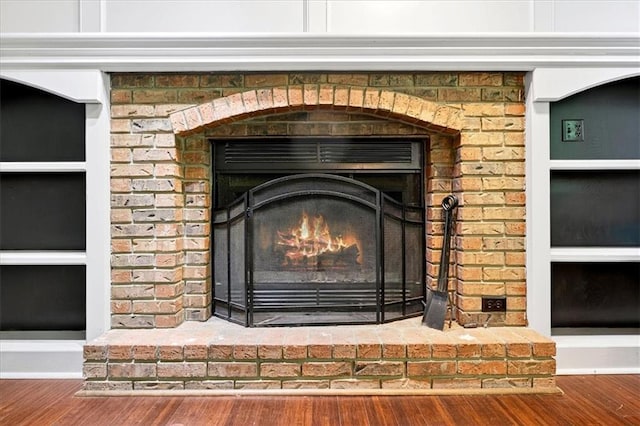 15820 W 150th Ter, Olathe, KS 66062 - detailed view of a fireplace and wood finished floors