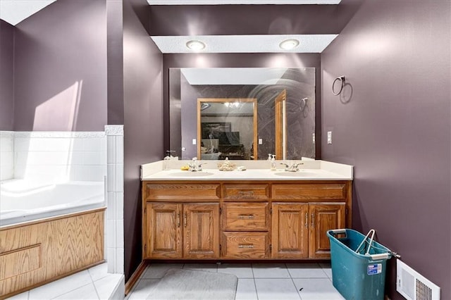 15820 W 150th Ter, Olathe, KS 66062 - full bathroom featuring tile patterned floors, double vanity, and a garden tub