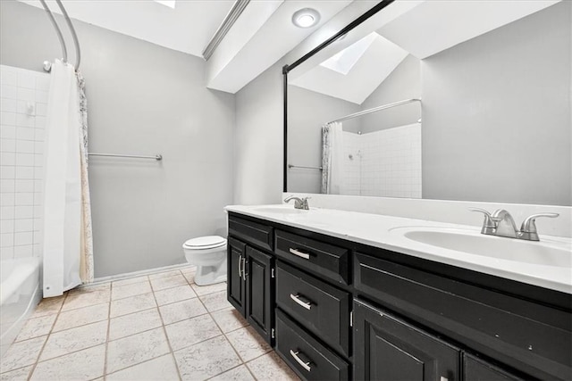 15820 W 150th Ter, Olathe, KS 66062 - bathroom featuring double vanity, a skylight, shower / bath combo with shower curtain, and tile patterned flooring