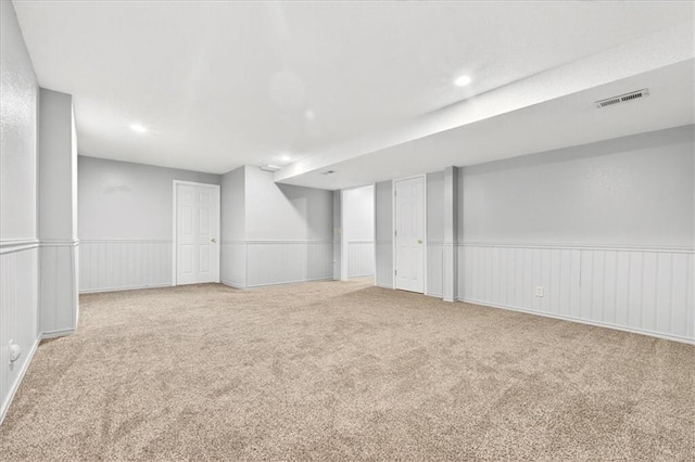 15820 W 150th Ter, Olathe, KS 66062 - finished basement with carpet flooring, a wainscoted wall, and recessed lighting