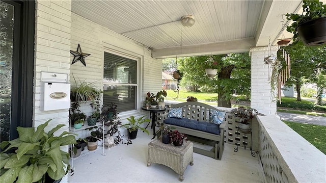 309 College St, Paola, KS 66071 - view of covered porch
