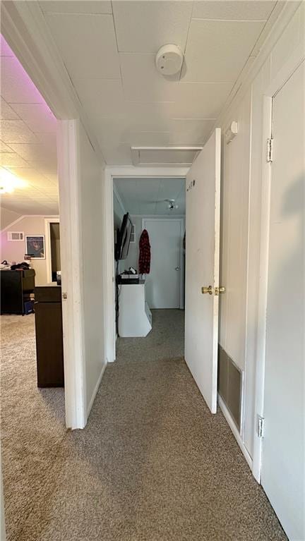 309 College St, Paola, KS 66071 - corridor featuring carpet flooring