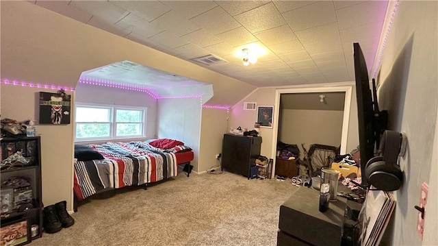 309 College St, Paola, KS 66071 - bedroom featuring carpet and vaulted ceiling