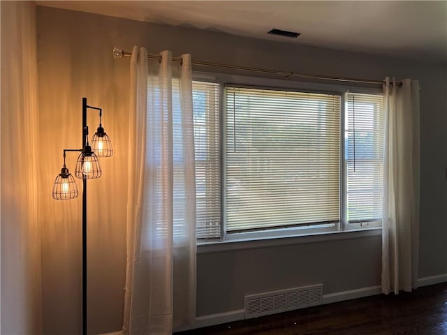 5921 Lexington Ave, Kansas City, MO 64123 - detailed view of wood finished floors and baseboards