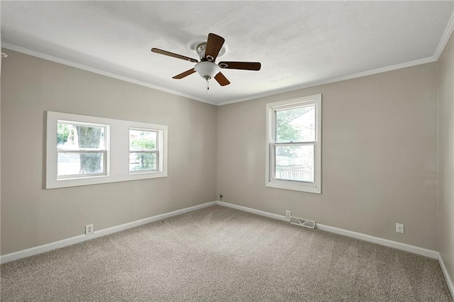 813 S Hardy Ave, Independence, MO 64053 - spare room with carpet flooring, a ceiling fan, and ornamental molding