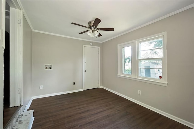 813 S Hardy Ave, Independence, MO 64053 - unfurnished room featuring ceiling fan, dark wood-style flooring, and crown molding