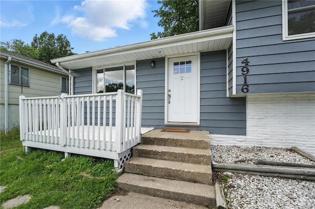 4916 N Manchester Ave, Kansas City, MO 64119 - doorway to property with a deck