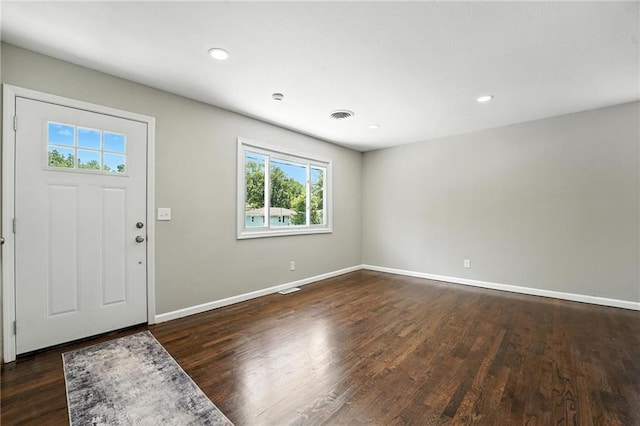 4916 N Manchester Ave, Kansas City, MO 64119 - foyer entrance featuring plenty of natural light, dark wood finished floors, and recessed lighting
