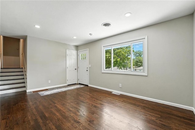 4916 N Manchester Ave, Kansas City, MO 64119 - entrance foyer featuring wood finished floors, stairway, and recessed lighting