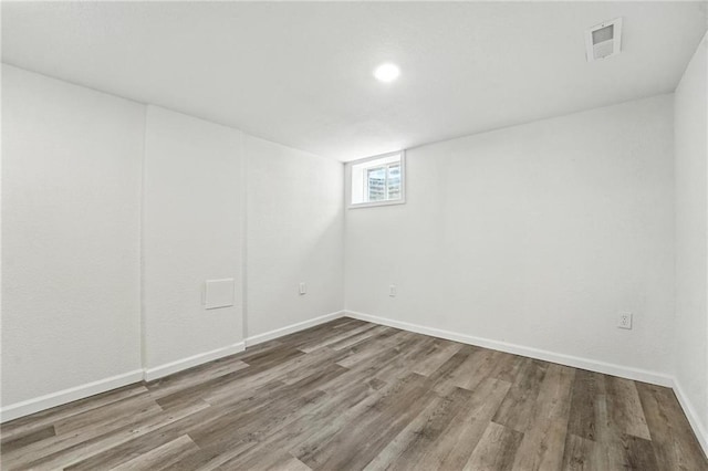 4916 N Manchester Ave, Kansas City, MO 64119 - below grade area with wood finished floors and recessed lighting