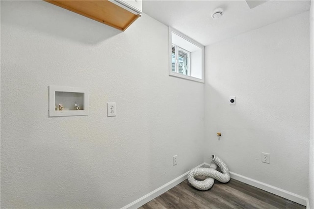 4916 N Manchester Ave, Kansas City, MO 64119 - washroom with electric dryer hookup, wood finished floors, and hookup for a washing machine
