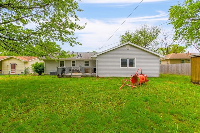 904 Leone Ave, Sedalia, MO 65301 - back of property featuring a wooden deck