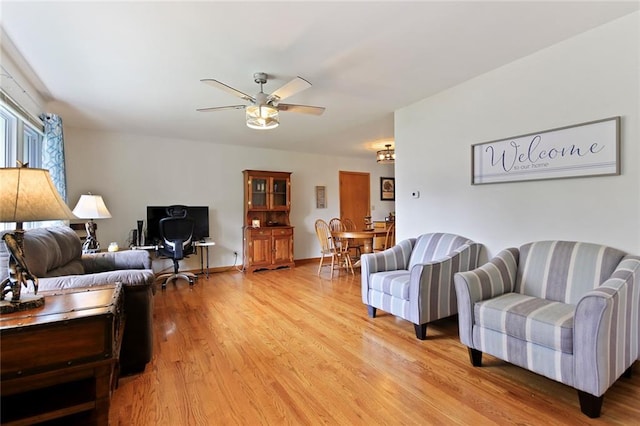 904 Leone Ave, Sedalia, MO 65301 - living area featuring light wood finished floors and ceiling fan
