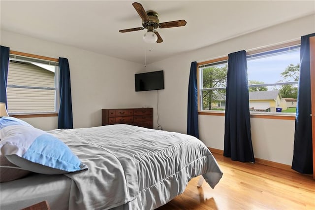 904 Leone Ave, Sedalia, MO 65301 - bedroom with wood finished floors and ceiling fan