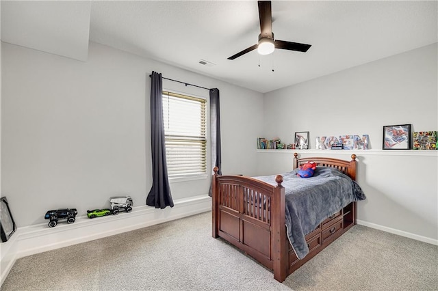 1296 NW Lindenwood Dr, Grain Valley, MO 64029 - bedroom featuring light carpet and a ceiling fan