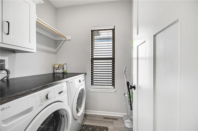 1296 NW Lindenwood Dr, Grain Valley, MO 64029 - washroom with cabinet space and washer and clothes dryer