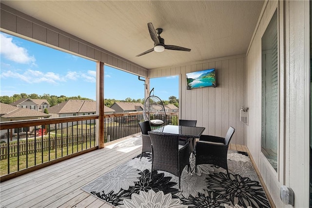 1296 NW Lindenwood Dr, Grain Valley, MO 64029 - deck featuring a ceiling fan, a residential view, and outdoor dining space