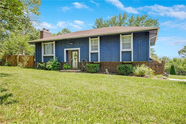 4252 SE Valleyview Ln, Holt, MO 64048 - bi-level home featuring a chimney and stucco siding