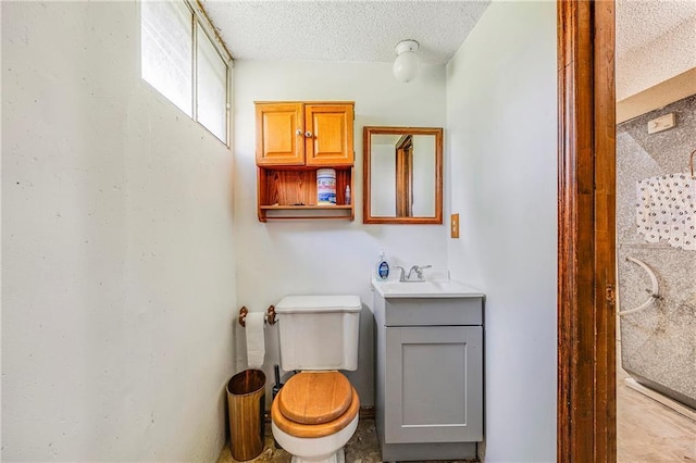 4252 SE Valleyview Ln, Holt, MO 64048 - bathroom featuring a textured ceiling and vanity