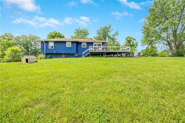 4252 SE Valleyview Ln, Holt, MO 64048 - back of house with a shed, a deck, and a lawn