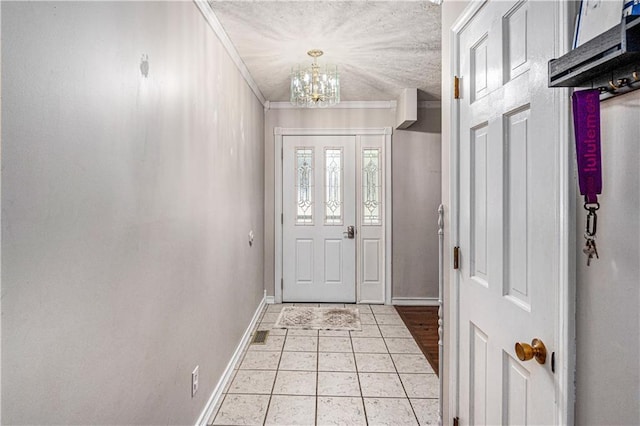 2518 Arrowhead Rd, Topeka, KS 66614 - doorway with a chandelier, light tile patterned flooring, and a textured ceiling