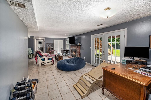 2518 Arrowhead Rd, Topeka, KS 66614 - living room with a textured ceiling, light tile patterned floors, french doors, and a fireplace