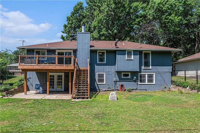 2518 Arrowhead Rd, Topeka, KS 66614 - back of house with french doors, stairway, a patio area, a wooden deck, and a chimney