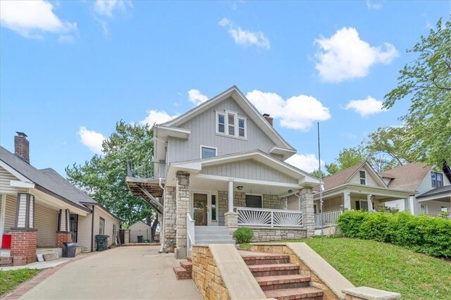 362 S 10th St, Kansas City, KS 66102 - view of front of property featuring covered porch and stone siding