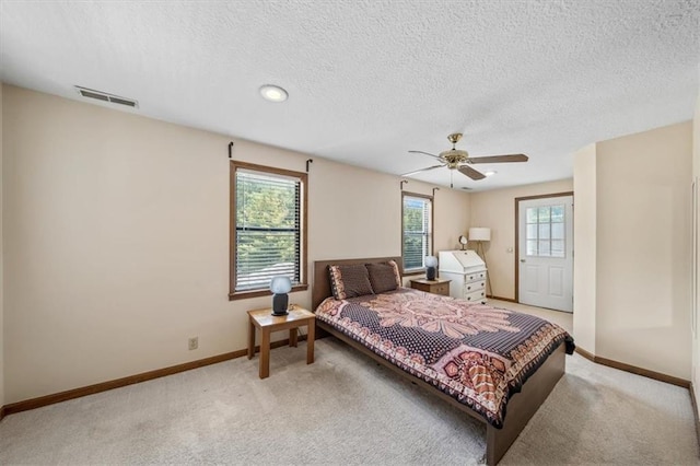 362 S 10th St, Kansas City, KS 66102 - bedroom with light carpet, a textured ceiling, ceiling fan, and recessed lighting