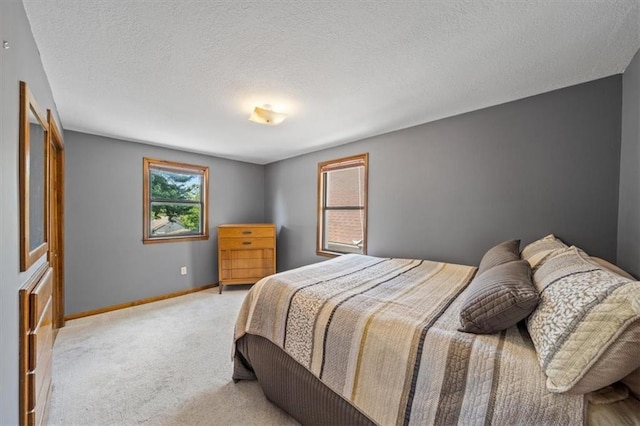 362 S 10th St, Kansas City, KS 66102 - bedroom featuring carpet floors and a textured ceiling